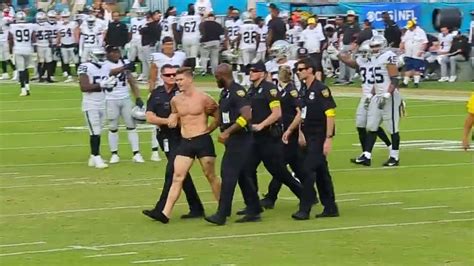 popularmmos shirtless|streaker runs on the field at Raiders.